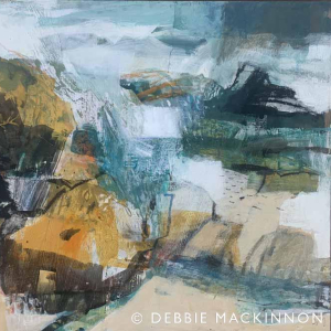 Abstract image of yellow and grey white rocks with a blue ocean with waves and sea spray