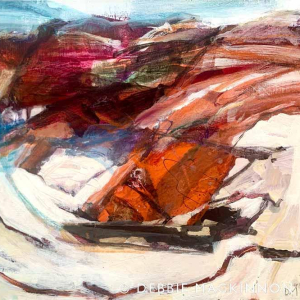 Abstract orange and pink rocks with blue and white ocean in the background